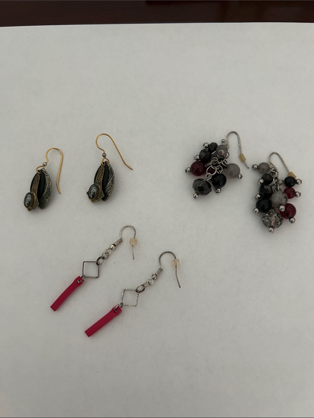 Lot of three pair. Pierced earrings.